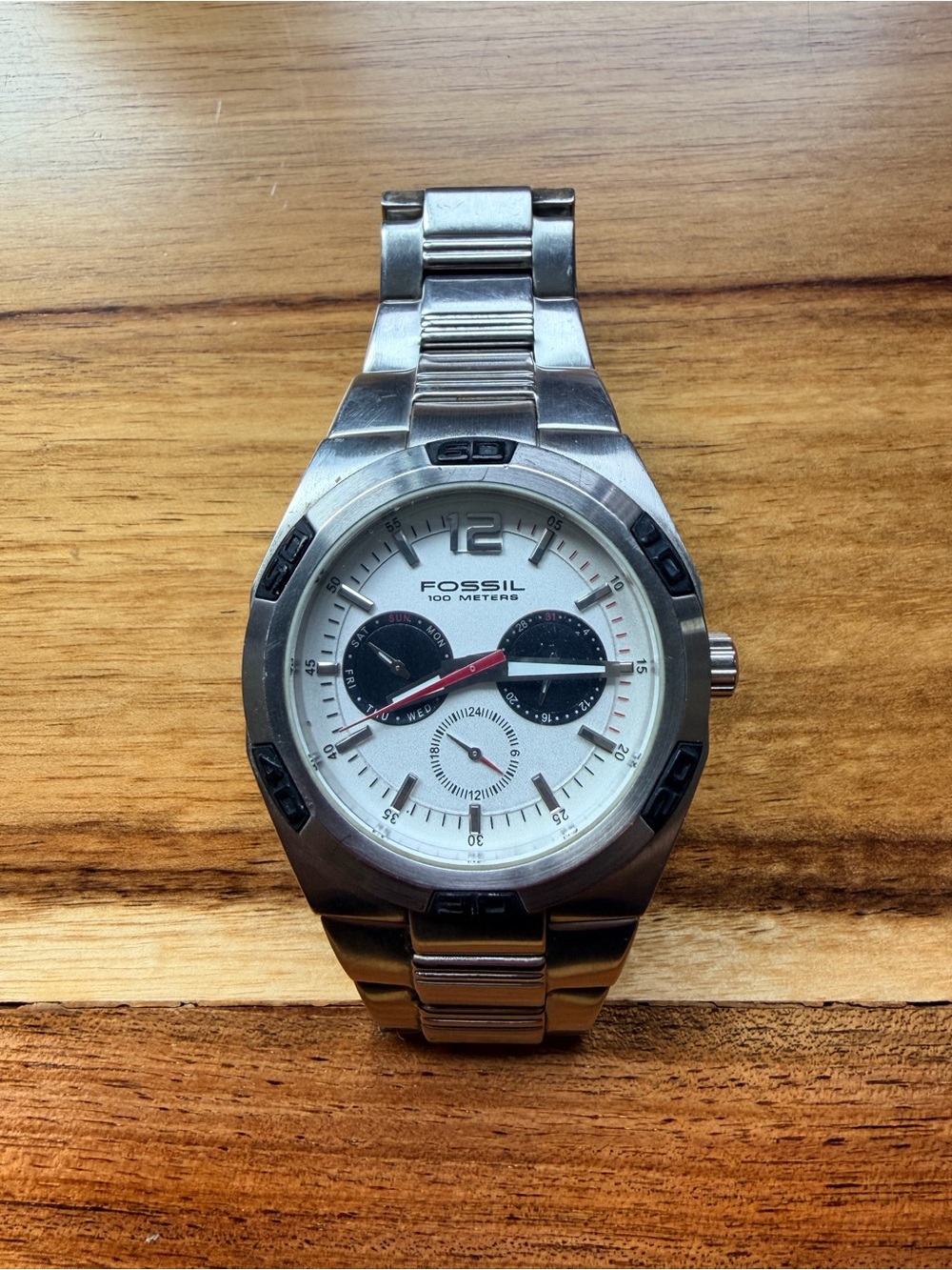Fossil Silver and White Men’s Chronograph Watch with Red Accents